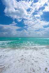 Crystal-clear sea beach water. Luxury sea beach resort. Beautiful sea beach sunset. Calm sea beach seascape. Idyllic summer paradise.