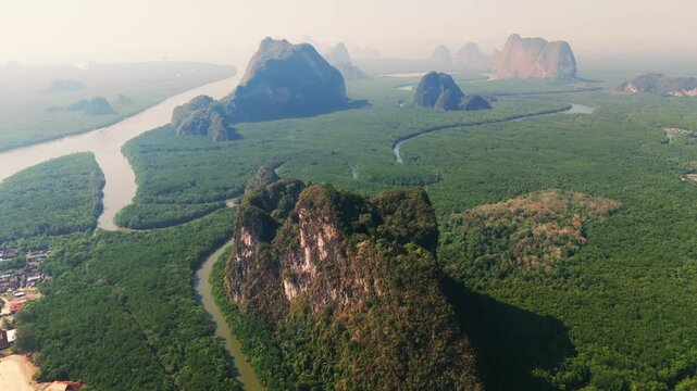 Aerial drone fly above Tower karst rock structures in Thailand National Park ao phang nga
