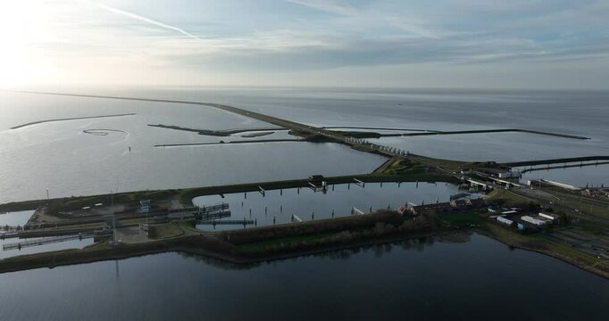Lorentz locks, water way, transportation infrastructure at the Afsluitdijk, Kornwerderzand, Friesland, The Netherlands. Aerial drone view.