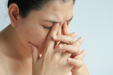 Woman face with sinusitis or sinus pain, health concept