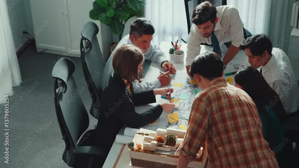 Aufkleber group of diverse team planning strategy while sitting at table with project plan. top aerial view of