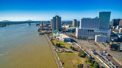 Fototapeta premium New Orleans, Louisiana - Aerial view of cityscape and Mississippi River