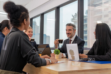 Business people or team with laptop in office for meeting,Multicultural professional businesspeople working together on research plan in boardroom.