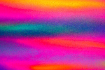 Colorful graffiti painted on a wall. Abstract urban background for design. Spray painting art.