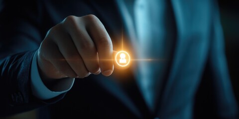 A man is holding a hand up to a glowing image of a person. Concept of importance and significance