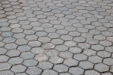 Detailed closeup of a brick pavement with a hexagonal pattern