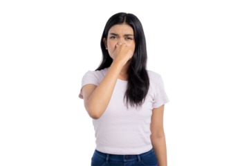 Young Asian woman holding her nose and reacting to unpleasant smell, disgusted expression, isolated on transparent background