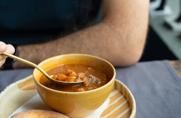 Spicy kharcho or harcho soup, traditional Georgian chowder. Creamy kharcho broth