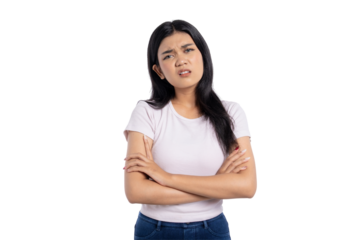 Confused young Asian woman with arms crossed, looking frustrated, isolated on transparent background