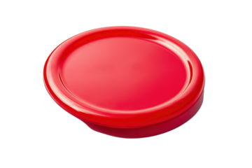 A vibrant red frisbee resting on a smooth white surface, perfect for outdoor fun on a sunny day