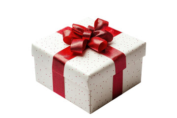 Fototapeta premium A beautifully wrapped gift box adorned with a vibrant red ribbon and bow awaiting celebration