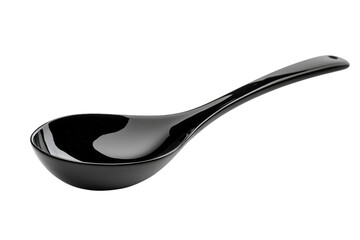 Sleek black ceramic spoon resting elegantly on a minimalist kitchen countertop
