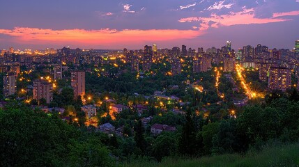 Obraz premium Cityscape at dusk, illuminated buildings, lush greenery