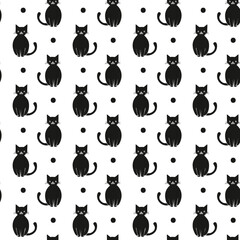 Seamless pattern of black cats and dots on a white background