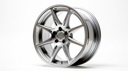 Obraz premium A solitary and elegant silver alloy wheel stands out with its intricate 10-spoke design. The smooth finish catches the light, highlighting its modern craftsmanship and aesthetics
