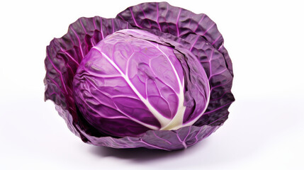 Obraz premium A fresh purple cabbage rests isolated on a pristine white background. Its vibrant colors and intricate leaf patterns highlight its natural beauty, suitable for cooking or garnishing dishes