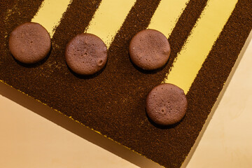 chocolate cookies on yellow background