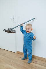 In a warm and cozy interior, a cheerful and joyful toddler enthusiastically engages with a colorful...