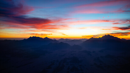 Beautiful colourful sunset behind the mountains