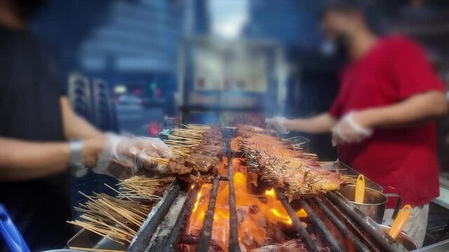 Experience traditional roaster Satay in Lau Pa Sat (old market) Singapore. 
