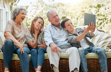 Grandparents, children and selfie with tablet in patio on couch at home for social media and profile picture. People, family and smile on visit for break, relax and rest with bonding and support