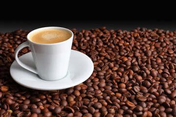 Elegant White Coffee Cup with Espresso coffee and Dark Roast Beans