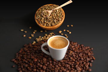 Cup of Espresso with toasted Coffee Beans and a Wooden Bowl of Green Beans