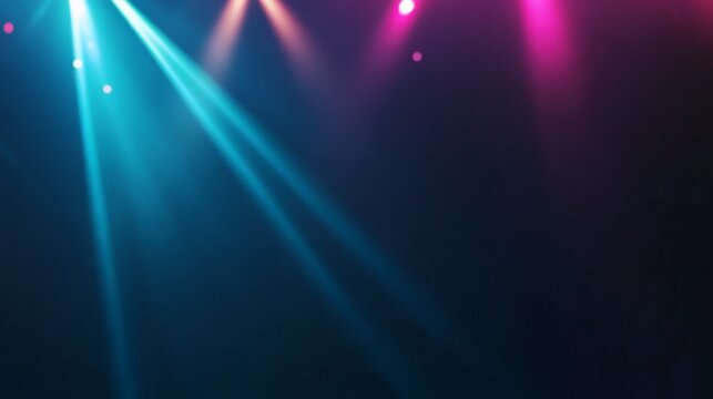 A close-up shot captures an abstract composition where luminous pink and orange beams intersect against a deep blue backdrop, creating an electrifying visual experience