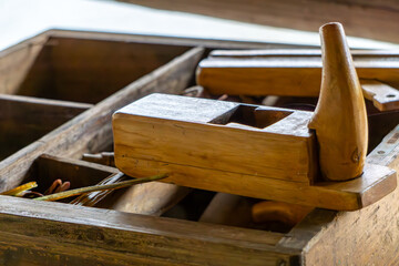hand plane for wood. old tool for shaping wood. carpentry tool.