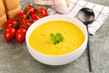 Vegetarian corn cream soup served parsley