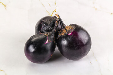 Raw violet and black eggplant