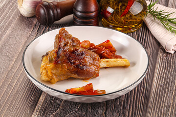 Baked lamb shank with vegetables