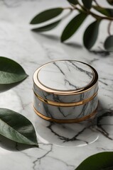 Elegant marble container placed on a polished surface with greenery on a sunny afternoon