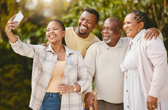 Smile, black couple and selfie of senior parents outdoor for holiday, vacation or family memory. Elderly mother, father and happy adult son with daughter in law for photo of people together at garden