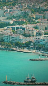 Kusadasi, Aydin, Ayd n Province, Turkey. Waterfront And Kusadasi Cityscape In Sunny Summer Evening. Scenic View Of Kusadasi Skyline At Aegean Coast, Turkey
