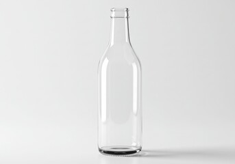 A clear glass bottle stands upright against a plain white background in a studio setting neutral light