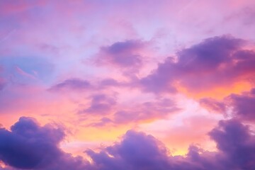 
Purple pink orange sunset. Colorful sky with clouds background with space for design.

