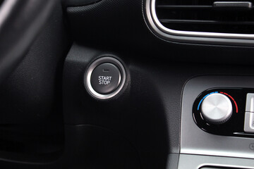Start Stop button electric car. The button for stopping the start of the car engine. Engine Start...