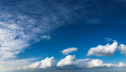 Fototapeta premium panoramic blue sky background with atmospheric clouds