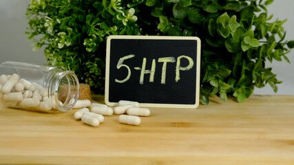 5-HTP sleep supplement capsules. Selective Focus.