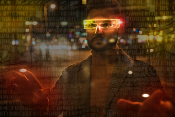 Man using augmented reality glasses at night in an urban setting