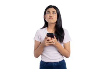 Young Asian woman looking frustrated while holding her smartphone, isolated on transparent background