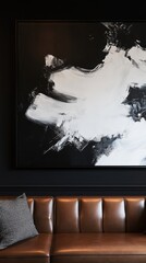 Modern abstract artwork enhances the stylish ambiance of a cozy cafe with dark walls and leather seating during the afternoon