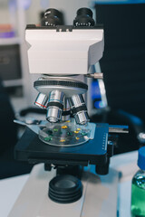 Team Asian scientists in a lab conducting food research using a microscope and lab equipment, showcasing innovation in food science and biotechnology