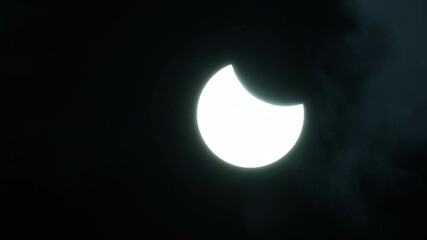 Partial solar eclipse with the moon passing in front of the sun on March 29, 2025 seen from Zwolle in Overijssel, The Netherlands. - Powered by Adobe