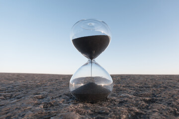 Hourglass close-up. Symbol of time running out