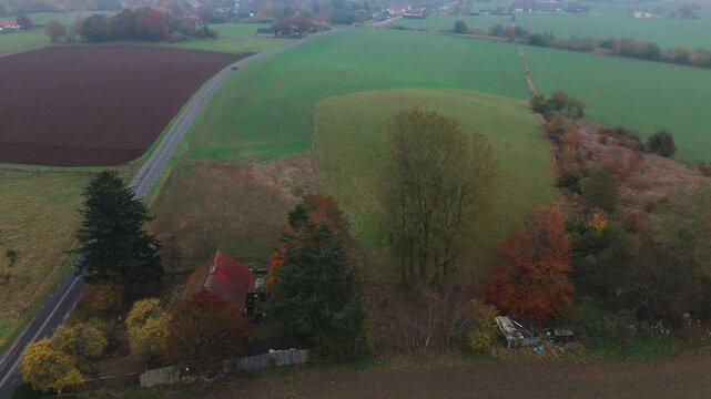 Aerial view of a small countryside town in &Ouml;sterlen, South Sweden, Foggy, Autumn, Fields, &Ouml;stra Vemmerl&ouml;v, Sk&aring;ne