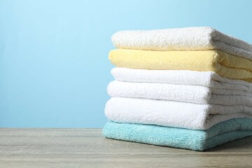 Stack of bath towels on the table