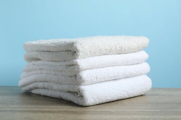 Stack of bath towels on the table