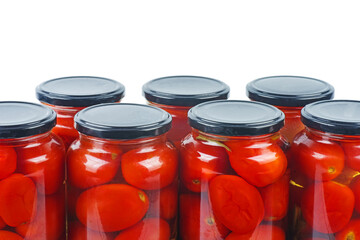 Some glass jare with tomatoes isolated on a white background
